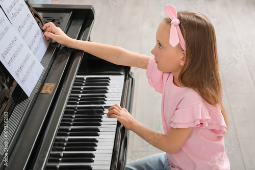Cute little girl with notes...