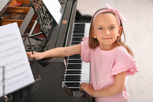 Cute little happy girl with...