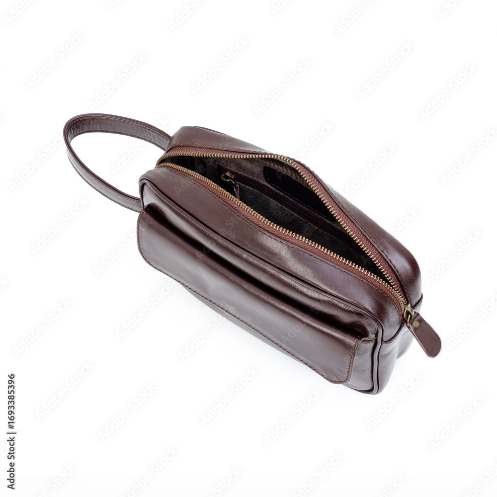 Naklejka premium Brown leather handbag isolated on white background, perfect for leather product catalog design