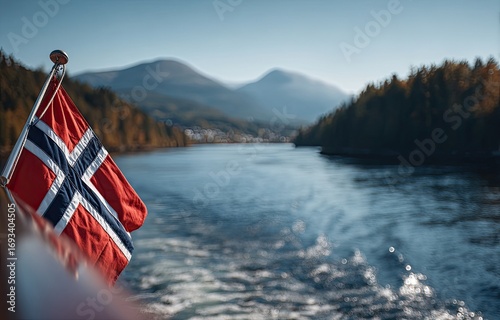 Norwegian flag on a boat, scenic river view