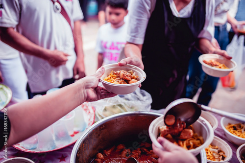 Help with feeding homeless people to alleviate hunger. poverty concept