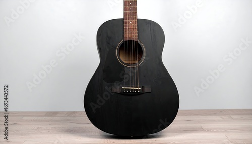 Black Acoustic Guitar on Floor