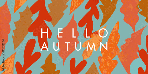 Warm autumn leaves pattern with hello autumn text overlay in white