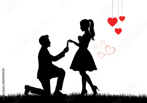 Silhouette of a marriage proposal at sunset
