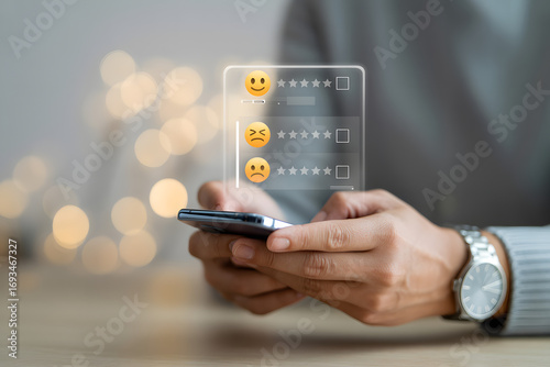 Customer Survey on Phone: Close-up on hands using a smartphone to fill a customer satisfaction survey, with floating emoticons. A digital feedback system and a survey form in place.
