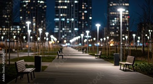 Urban Park Walkway with City Buildings and Night Lights