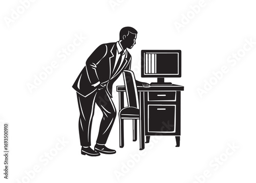 Businessman Examining Laptop.
