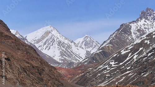 beautiful snowcapped himalayan mountain range from lahaul and spiti, hiking and adventure traveling in lahaul valley in himachal pradesh, india