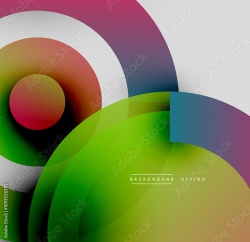 Abstract colorful circles overlap creating dynamic visual effect. Gradient shades blend smoothly, modern design element.