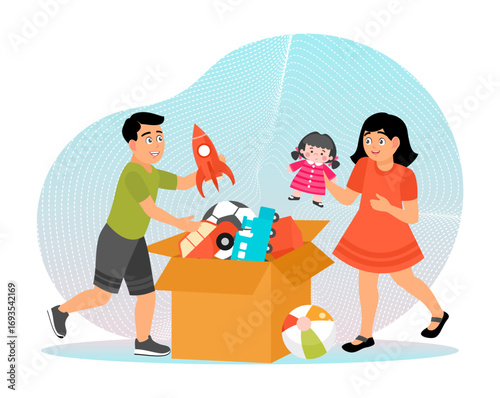 Children Sorting Toys Into a Box with Fun and Enthusiasm for Donation.