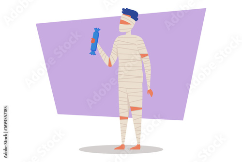 Person dressed as mummy standing and holding Halloween treat. Festive atmosphere marked by creative costume in preparation for Halloween party, showcasing spirit and fun
