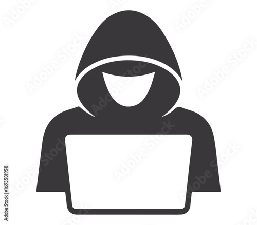 Anonymous hacker in a hooded sweatshirt using a laptop computer for cybercrime and online security threats