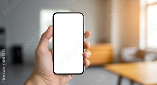 Smartphone in Hand, Blank Screen, Modern Technology.