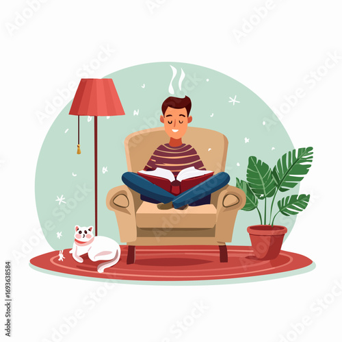Young Man Reading Book on a Comfortable Armchair at Home