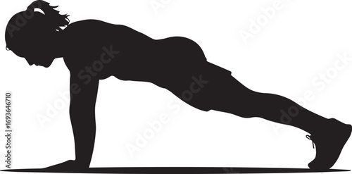 Silhouette of a fitness athlete performing a plank exercise on a yoga mat