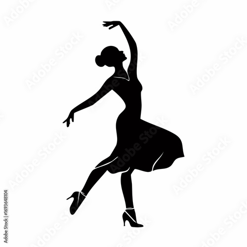 Elegant ballerina gracefully performing a dynamic dance pose in silhouette