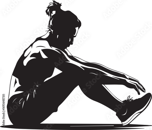 Athletic silhouette of fit man sitting resting after intense workout session