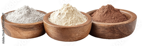 Three wooden bowls filled with different types of powder