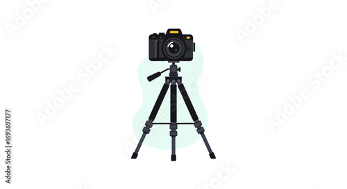 Front view of a black digital camera mounted on a three-legged tripod stand.
