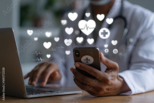 Doctor using laptop and phone with health icons