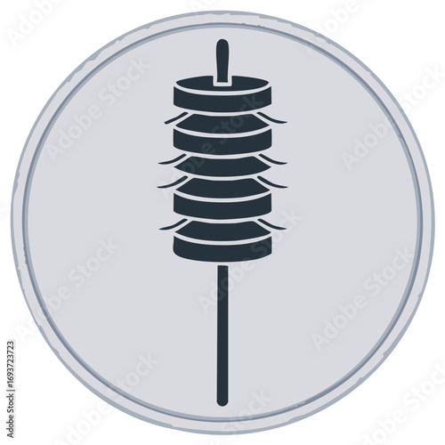 Black silhouette of a traditional wind chime with multiple stacked discs and a pole