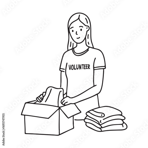 A volunteer organizing donated clothes