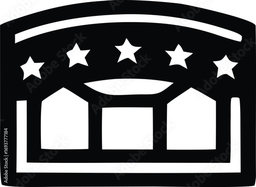 Classic marquee theater entrance with stars above distinctive ticket windows for entertainment venues