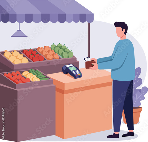 Man paying at a fruit and vegetable stall with a payment terminal.