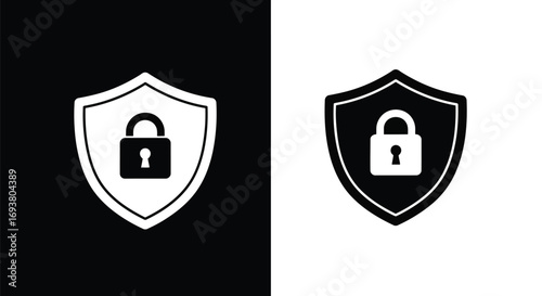 Vector illustration of two shields, one white on black and one black on white, each with a padlock icon, symbolizing dual security concepts