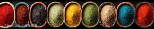 Colorful spice powders in small bowls