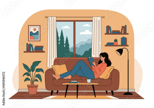 A person relaxing on a couch reading a book in a cozy living room with a large window offering a scenic view of nature