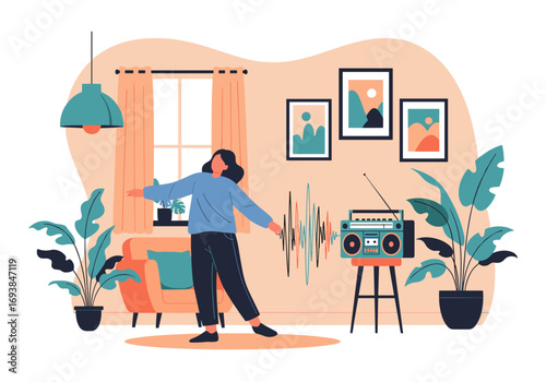 Young woman dancing happily in her living room enjoying music playing on a vintage boombox radiocassette player with artwork and plants around her