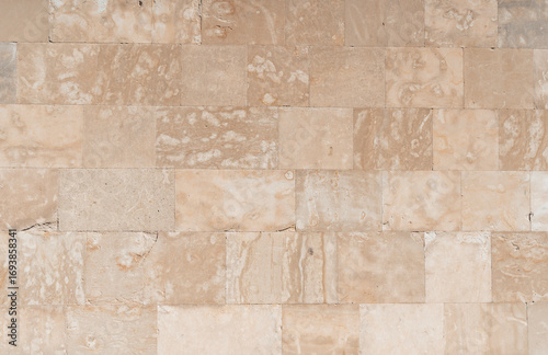 Wallpaper Mural Antique ancient stone wall masonry texture background. Old wall made of beige stone blocks  Torontodigital.ca