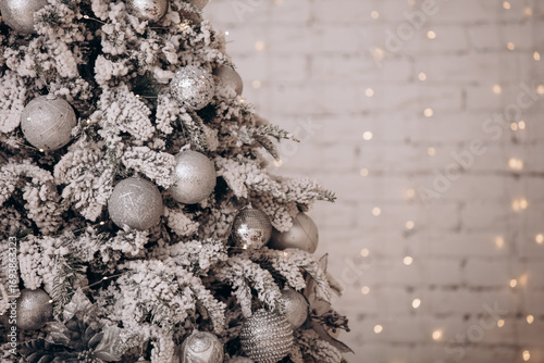 Christmas tree decorated in the snow close-up