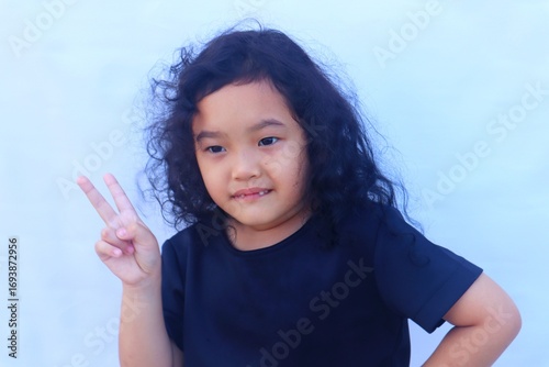 Expression of an Asian girl with a cute face.