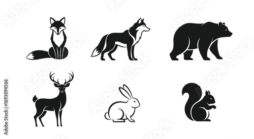 A collection of six black and white woodland animal silhouettes, including a fox, wolf, bear, deer, rabbit, and squirrel.