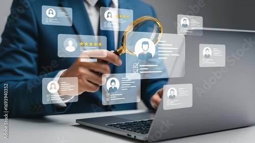 HR and Recruitment: Businessman with Magnifying Glass Reviewing Online Resumes and Candidate Profiles on Laptop for Human Resources Talent Acquisition and Job Search