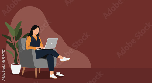 A young woman works remotely on her laptop, sitting comfortably in a modern, minimalist living space at home. Ideal for business, technology, or lifestyle concepts.