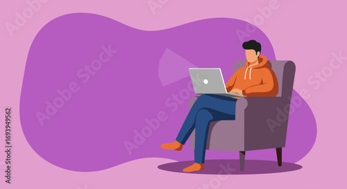 Comfortable man in a hoodie using a laptop in an armchair, representing modern remote work, online education, and digital lifestyle.