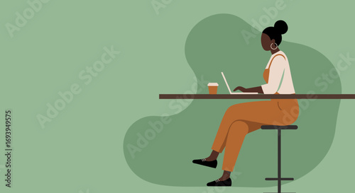 Professional Black woman concentrating on her laptop at a sleek counter with coffee. Illustrates remote productivity, digital entrepreneurship, and contemporary work-life balance.