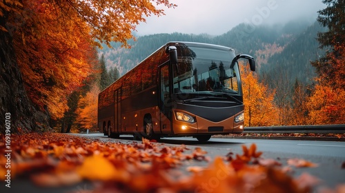 A bus drives through a picturesque autumn landscape, surrounded by vibrant orange and yellow foliage against a mountainous backdrop.