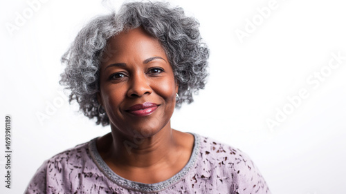 portrait of happy middle aged black woman isolated on white background