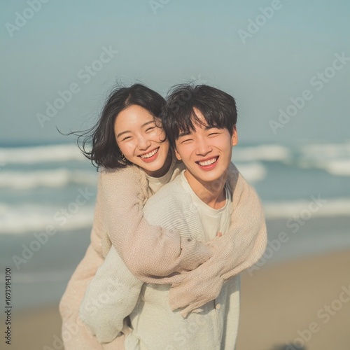 Young Korean couple enjoying summer beach