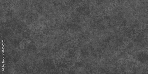 Dark abstract black grunge cement wall charcoal rock smooth plaster texture backdrop Black Board Texture design are light gradient background.	