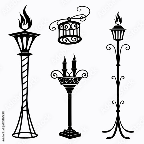 Black silhouette ornate lamps and candle holders light flame