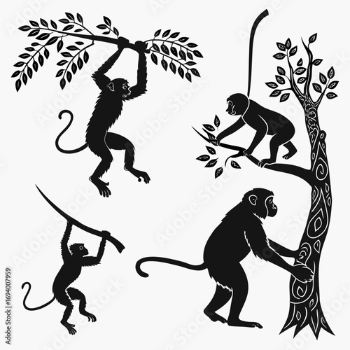 Four black monkey silhouettes hanging from trees branch