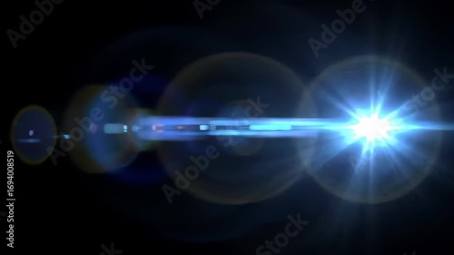 Abstract Blue Optical Lens Flare on a Black Background in Spotlight Style