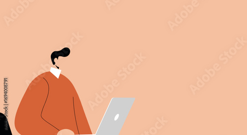 Focused man working on a laptop in a minimalist setting, representing remote work, online learning, and digital business productivity.