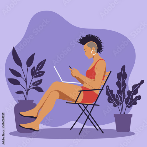 Modern individual with a distinctive hairstyle, using a laptop and smartphone in a relaxed setting. Represents remote work, digital multitasking, or leisurely online activity.