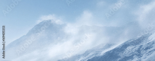 Majestic snowcovered mountains obscured by a blizzard, creating a serene and powerful winter landscape. Ideal for adventure, resilience, or climate themes.